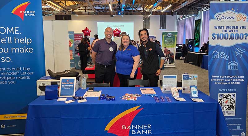 Banner Mortgage Loan Officers with a table at a Portland event