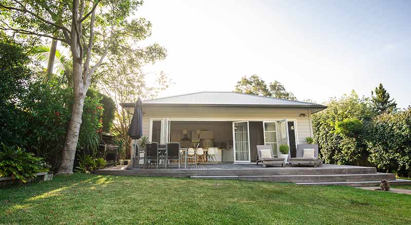 Home and backyard on a sunny day
