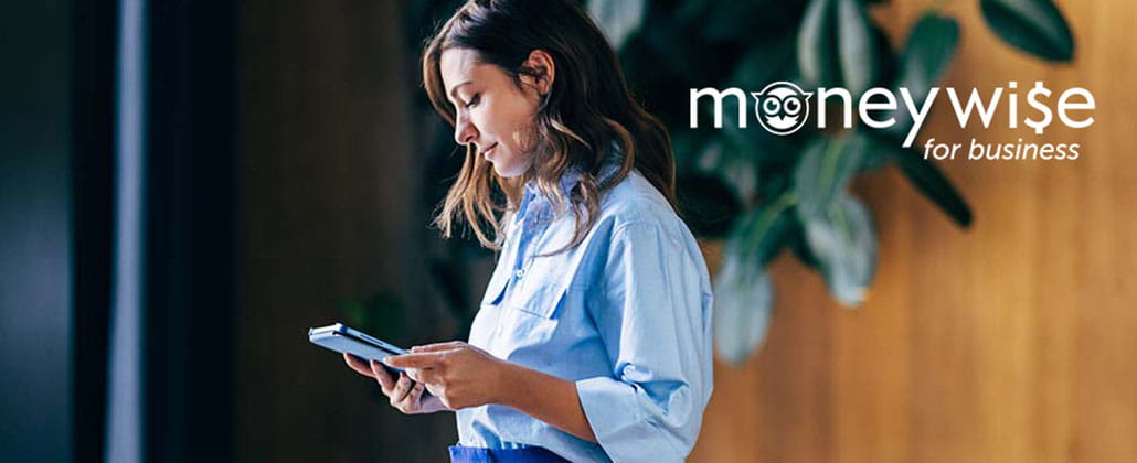 person looking at device with MoneyWise for Business logo