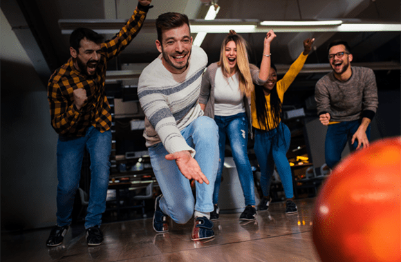 Group bowling and cheering