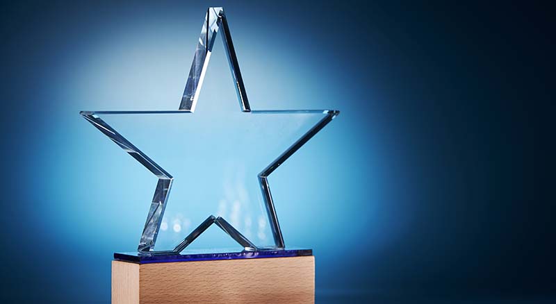 Image of a star trophy on a blue background