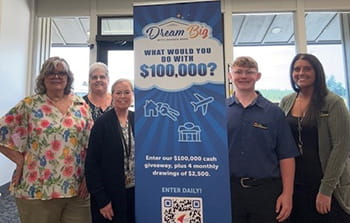 Pleasant Hill branch team with Dream Big sign