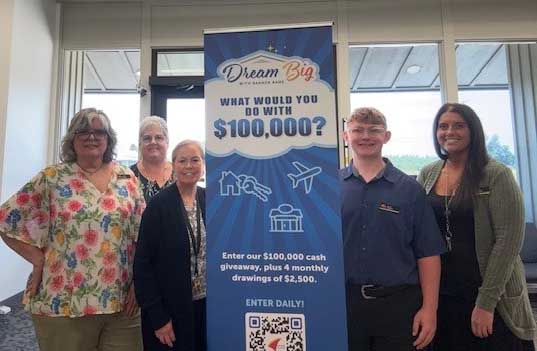 Pleasant Hill branch team with Dream Big sign