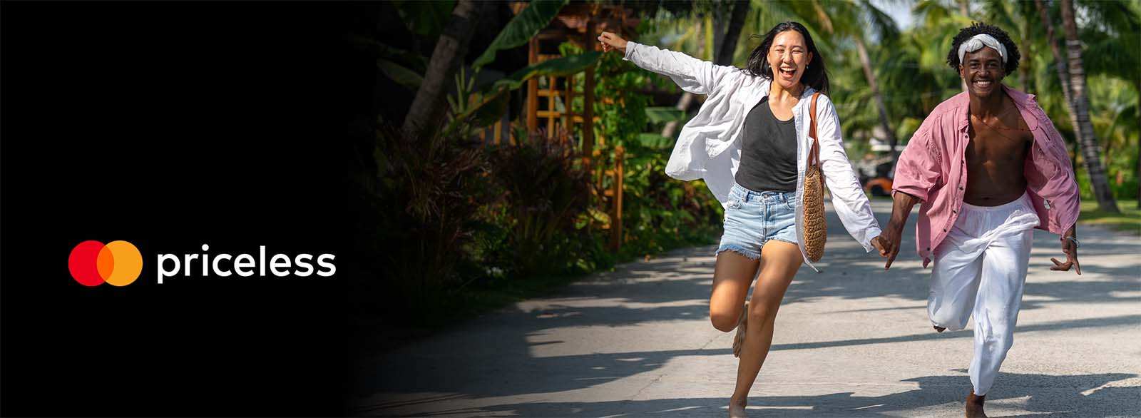 Two people smiling and running in a tropical location with priceless logo