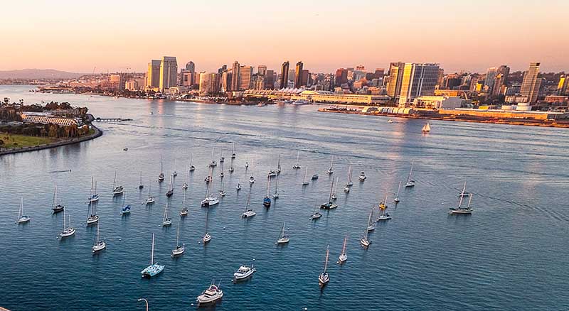 Photo of San Diego skyline and boats on the water