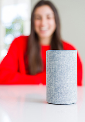 Person talking to Banner Virtual Assistant at home
