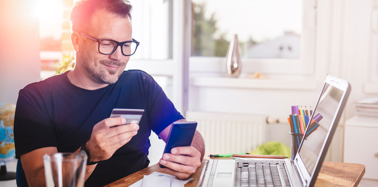 Man pays online with credit card