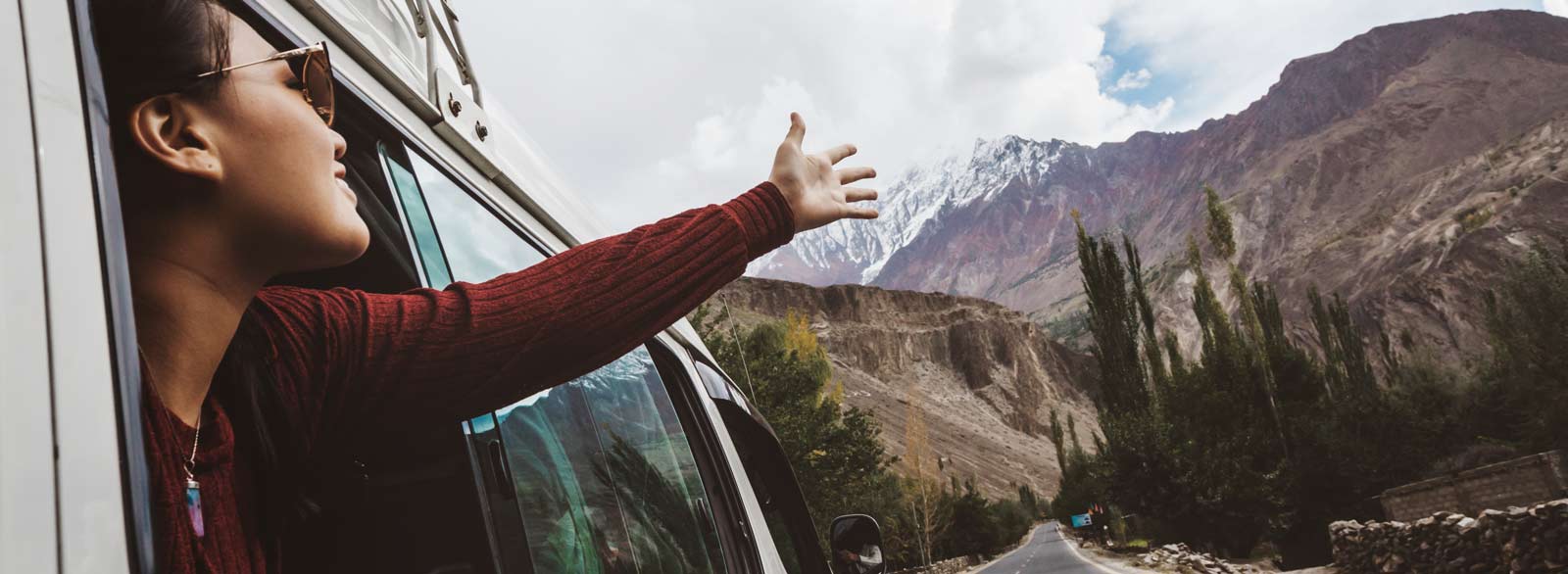 Woman drives through national park