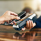 Person using digital wallet at store