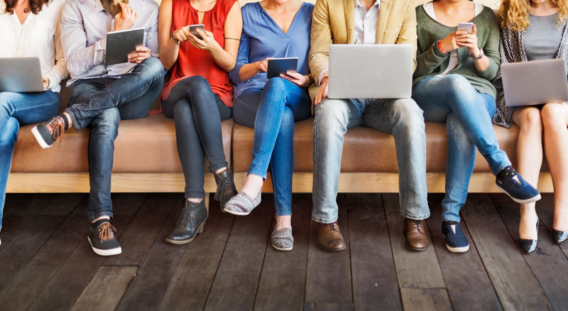 People using tablets, smartphones and laptops