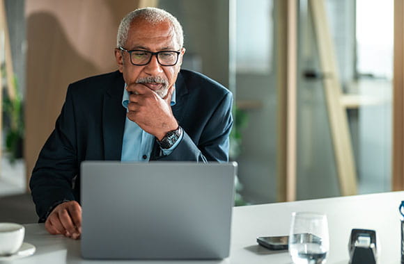 Person looking at laptop