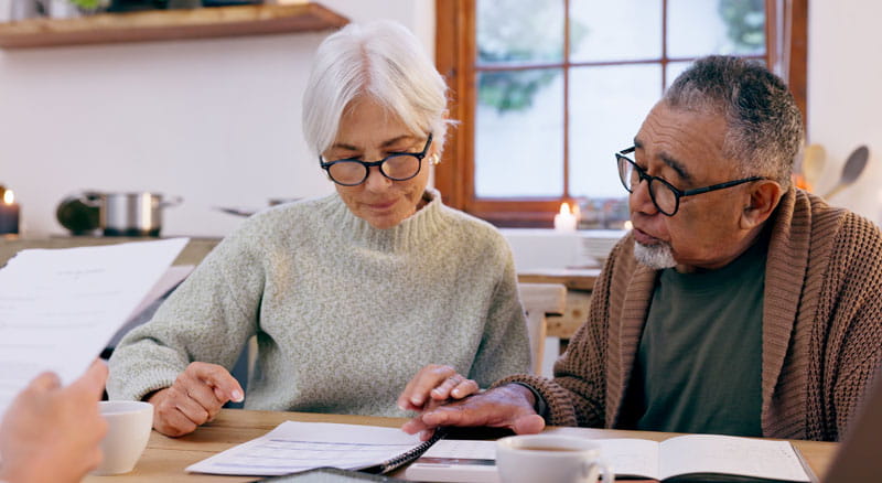 Older couple reviewing estate documents
